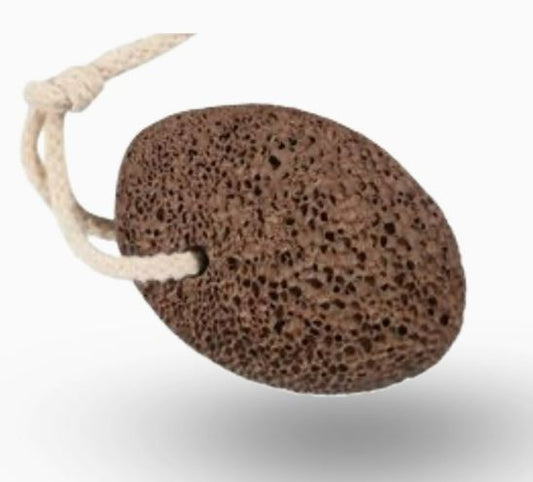 A natural brown pumice stone with a porous surface, attached to a white rope looped through a small hole for easy handling.